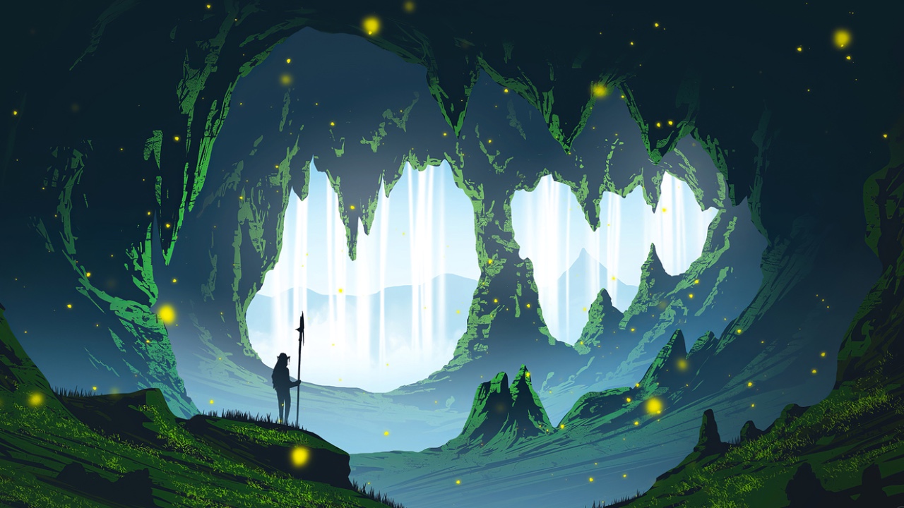 Person drinking a hot drink at the computer